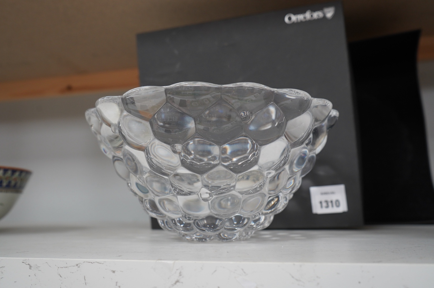 A modern boxed Orrefors glass bowl by Ann Nilsson, 12cm high. Condition - good